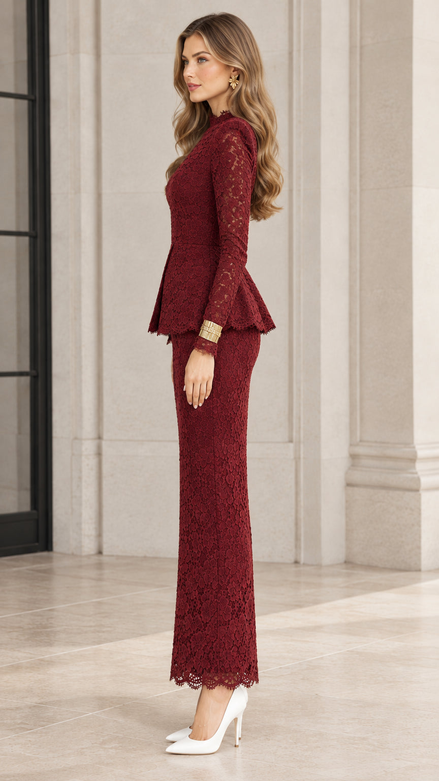 Side profile view of elegant burgundy lace long sleeve peplum evening dress