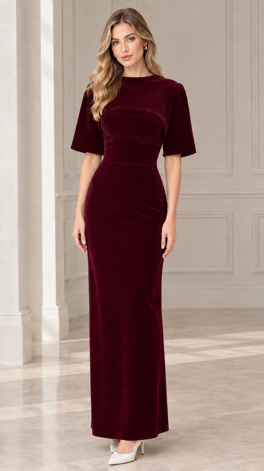 Model wearing burgundy wine red short sleeve velvet formal dress