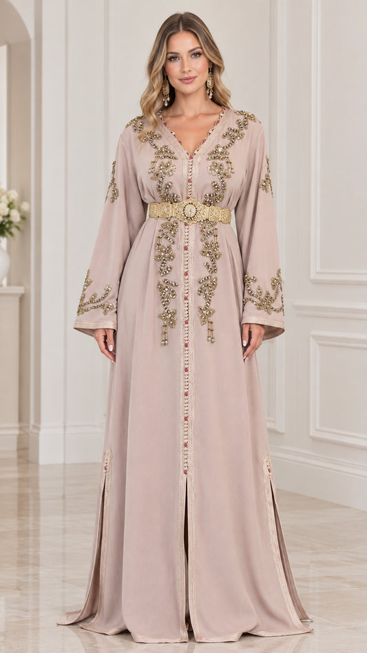 Front view of woman wearing Dusty Pink Moroccan embroidered kaftan maxi dress with gold belt