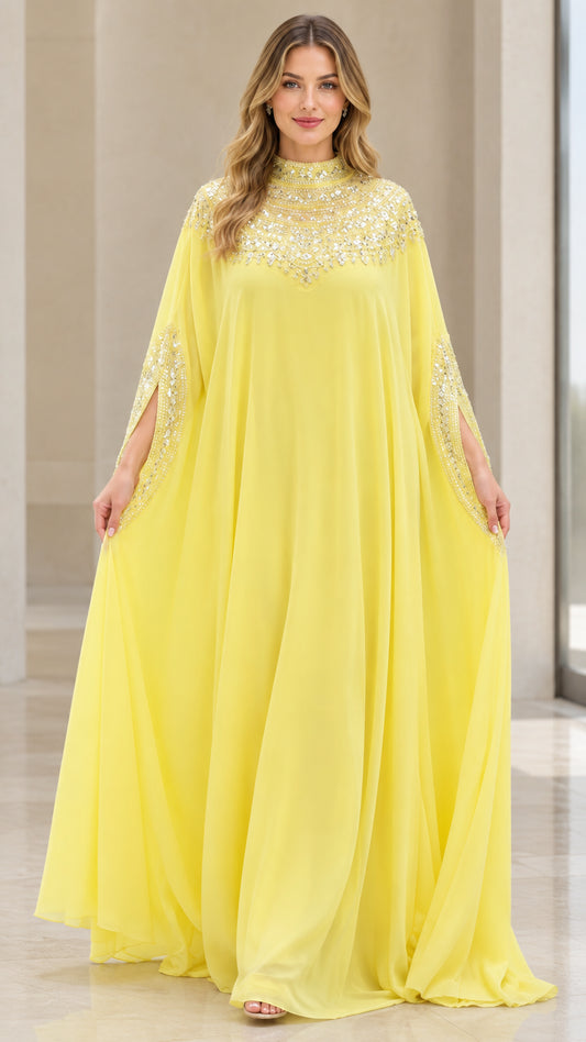 Front view of model wearing a bright yellow high neck beaded cape kaftan maxi dress