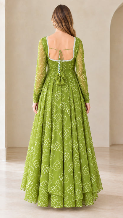Back view of olive green maxi dress showing back cutout and tassel ties