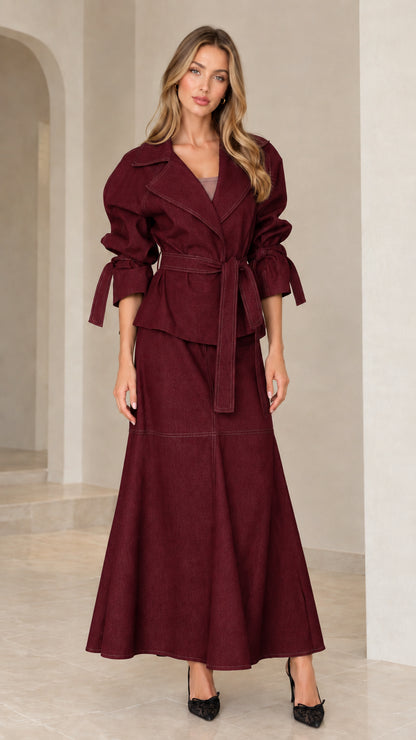 Front view of burgundy red belted lapel jacket and maxi skirt two-piece set