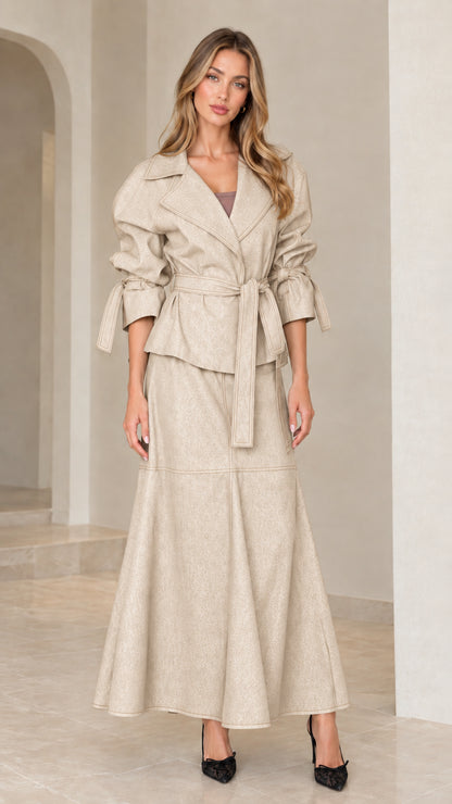 Front view of beige neutral belted lapel jacket and maxi skirt set